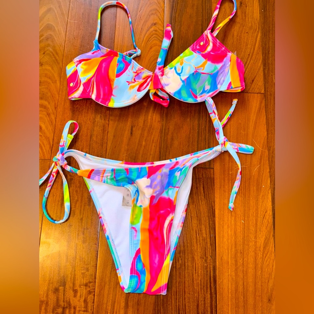 Super cute multi colored bikini set! Slightly worn!